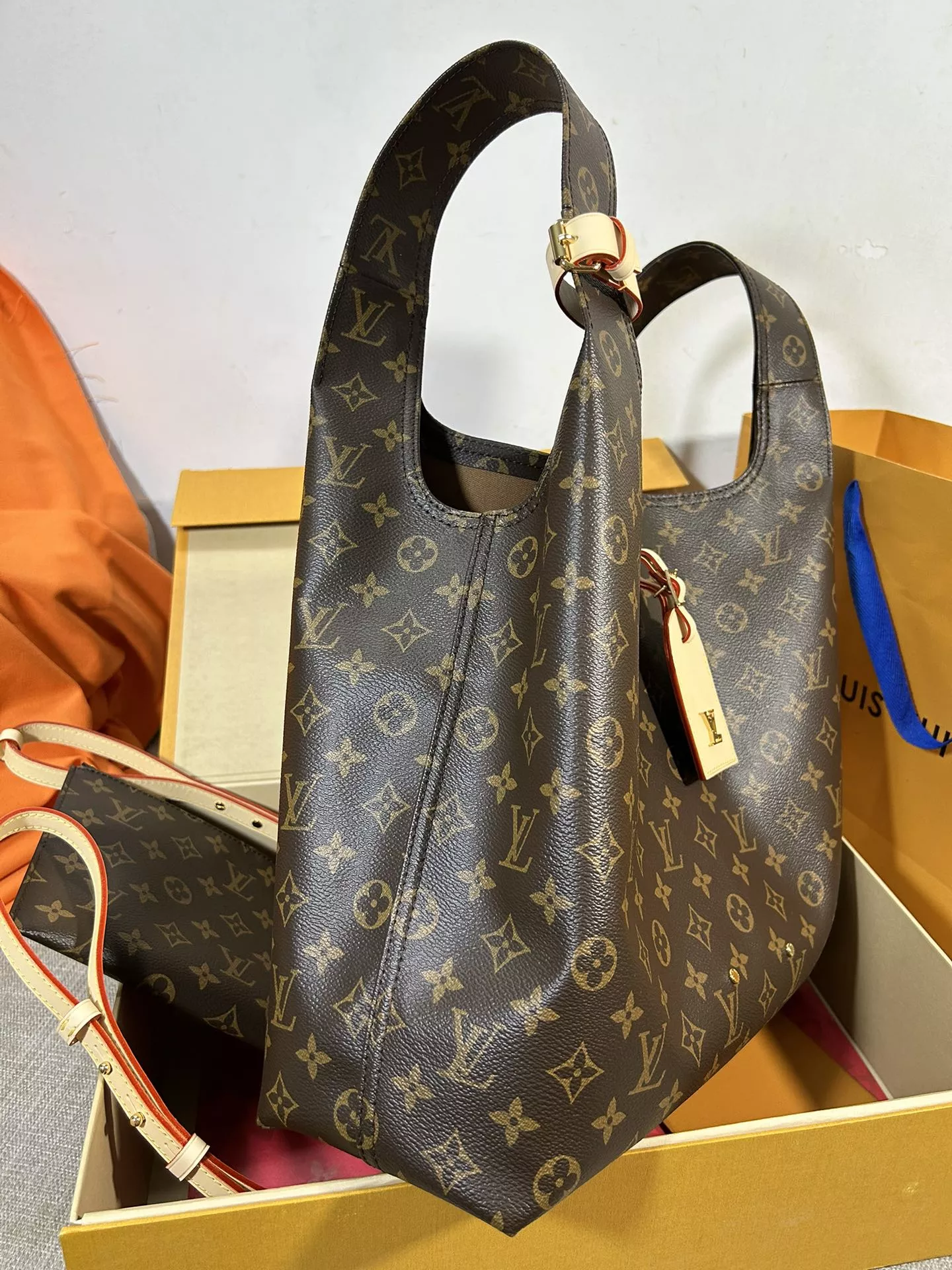 Louis Vuitton Atlantis GM in Coated Canvas with Gold-tone - Image 7
