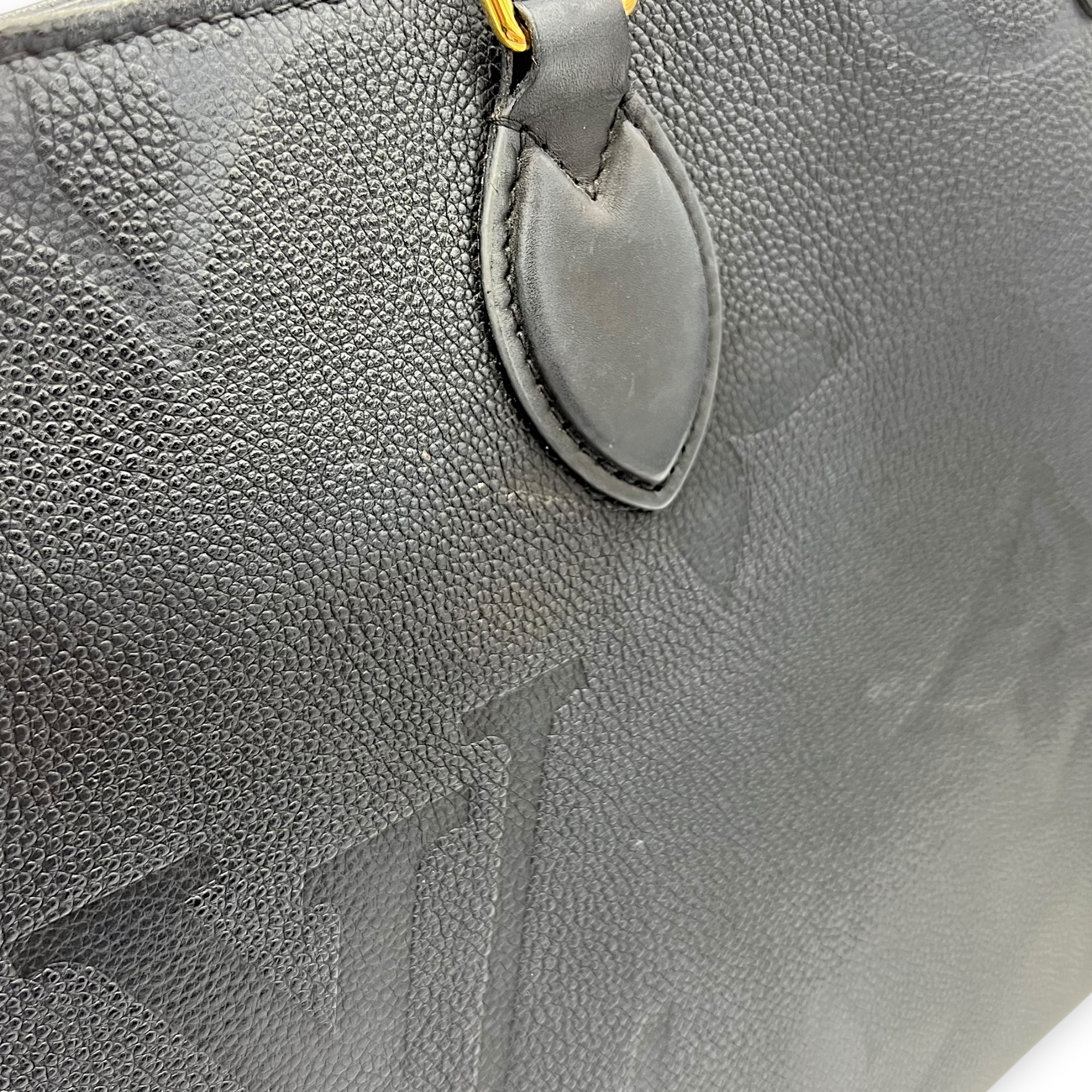 OnTheGo MM Black Top Handle Bag in Empreinte Leather, Gold hardware - Image 12